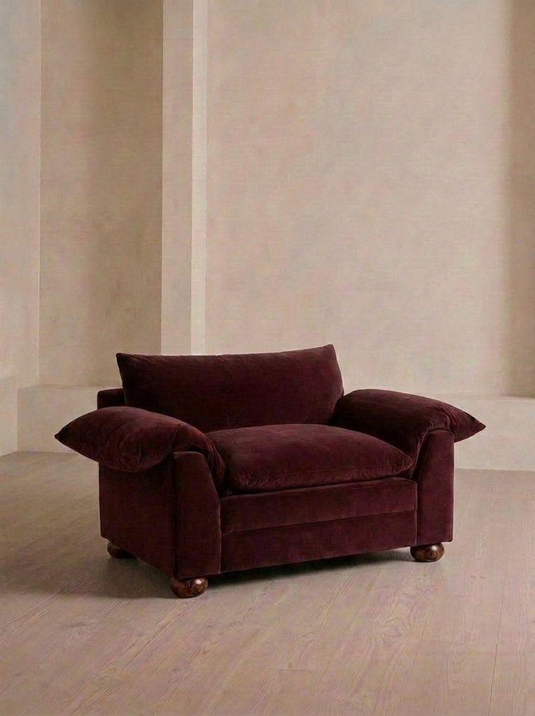 Burgundy velvet armchair