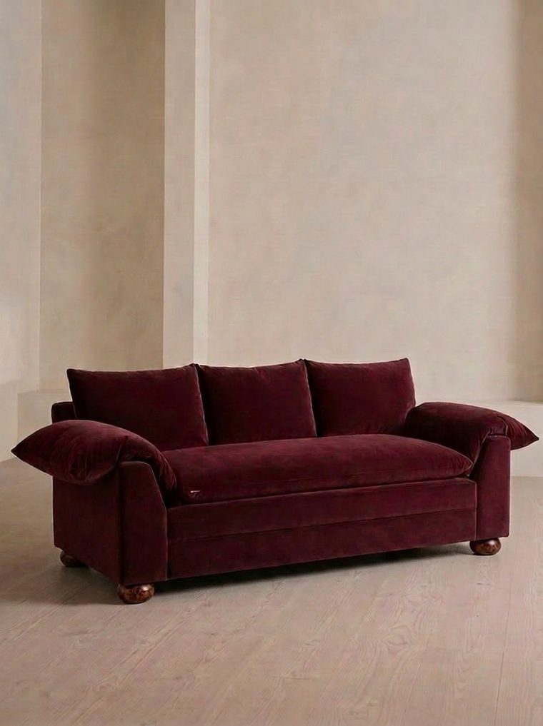 Burgundy velvet sofa